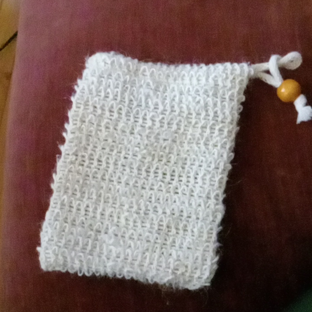 Exfoliating soap holder